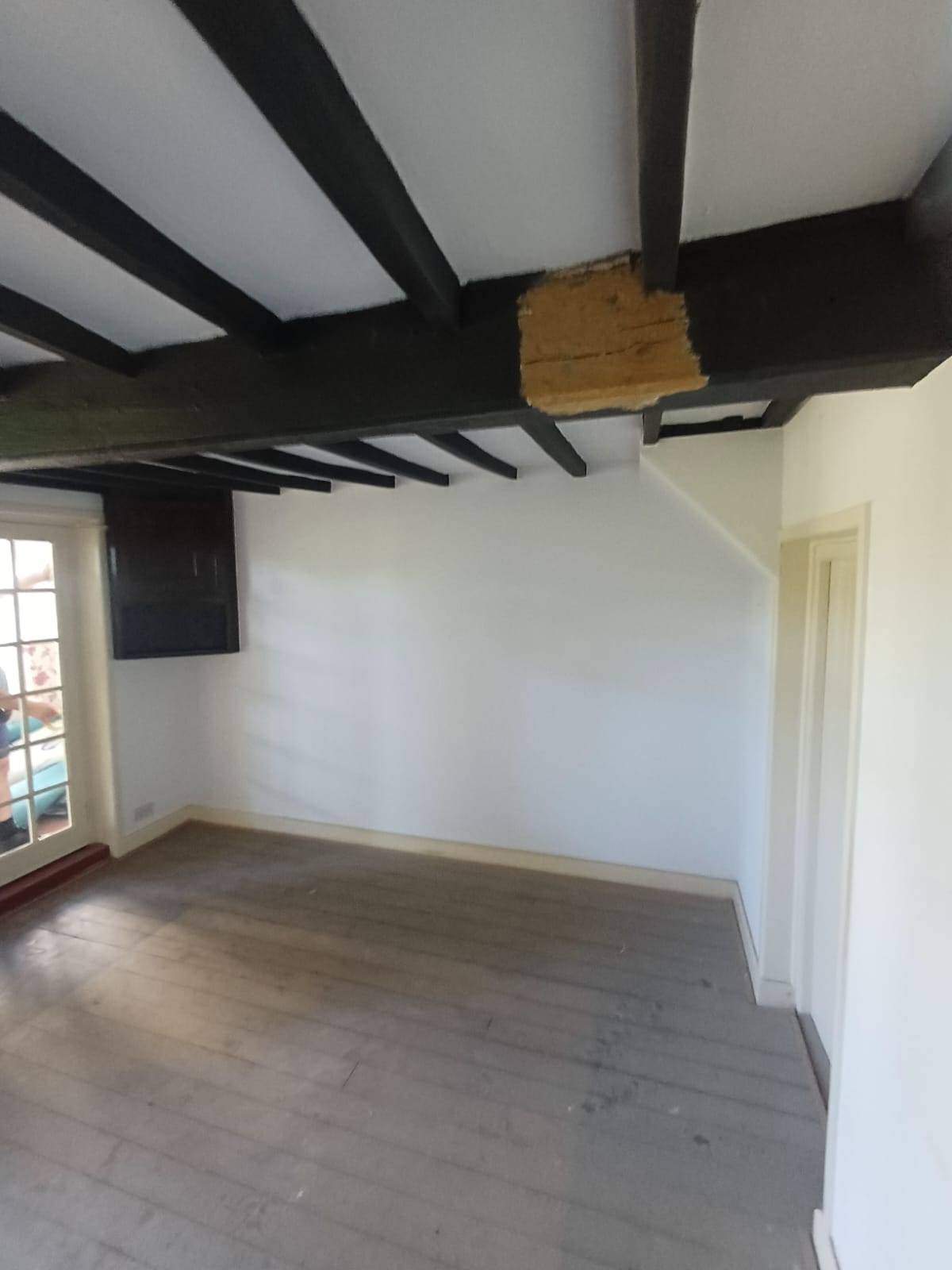 Oak beams restored to natural colour