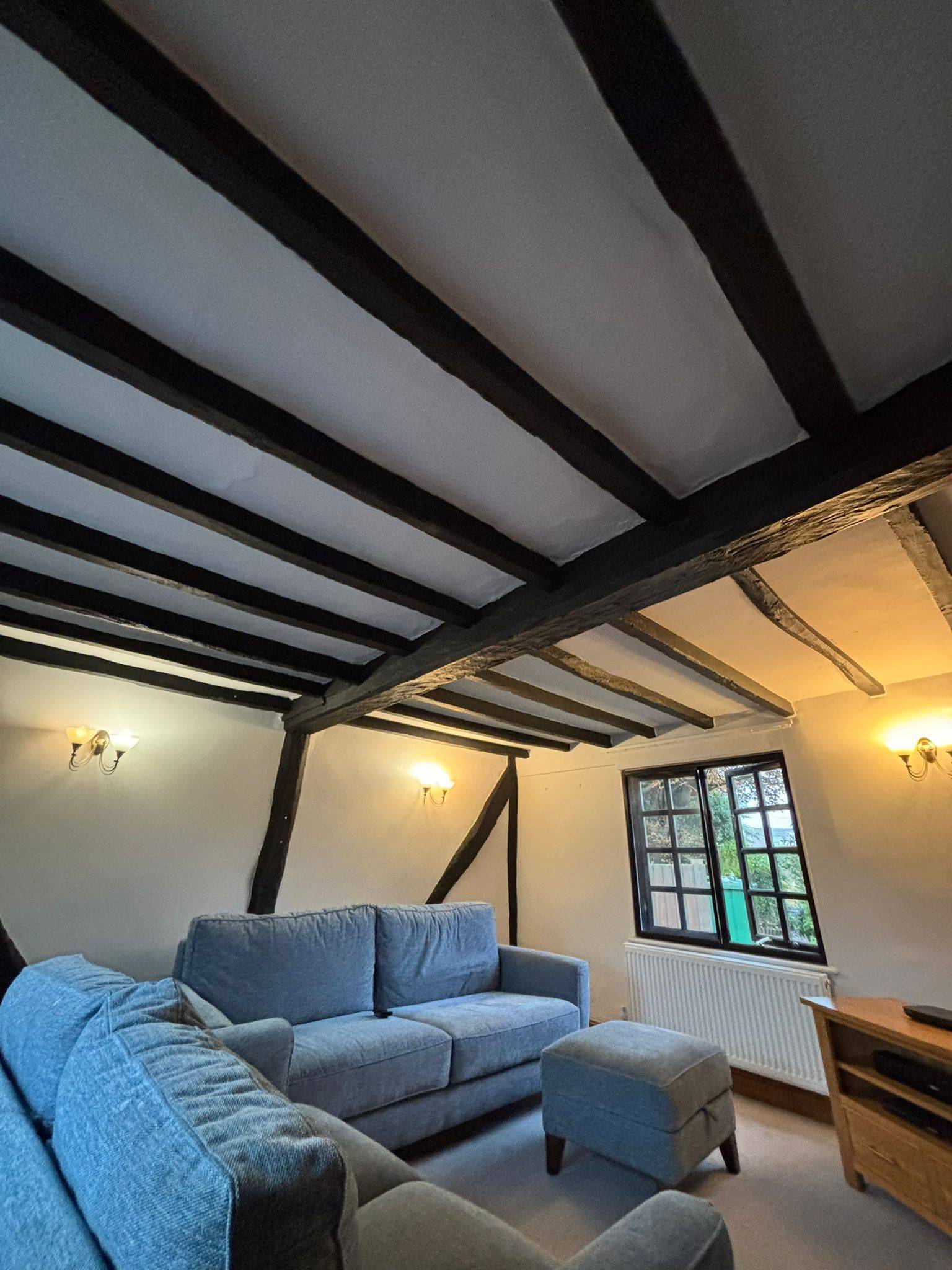 Oak beams prepared for brightening and restoration